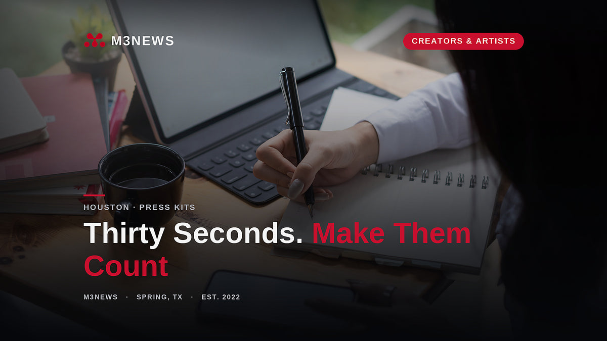 Hand taking notes beside a laptop at a desk, EPK press kit review, M3News