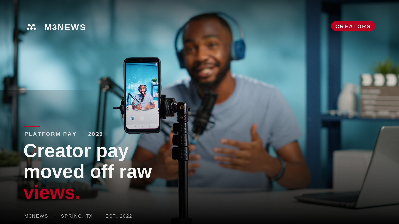 M3News cover: a content creator filming a video on a smartphone in a home studio, on how creators get paid in 2026.